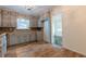 Kitchen with gray cabinets, granite countertops, and wood floors at 3936 Devonshire Dr, Marietta, GA 30066