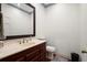 Clean bathroom with updated vanity and toilet at 2680 Spalding Dr, Sandy Springs, GA 30350