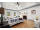 Main bedroom with fireplace and hardwood floors at 2680 Spalding Dr, Sandy Springs, GA 30350