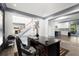 Home office with view into kitchen and hardwood floors at 2680 Spalding Dr, Sandy Springs, GA 30350