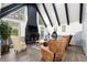 Vaulted ceiling living room with fireplace and hardwood floors at 2680 Spalding Dr, Sandy Springs, GA 30350