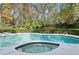 Large swimming pool with a built in spa at 2680 Spalding Dr, Sandy Springs, GA 30350