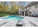 Inviting kidney-shaped pool with lounge chairs at 2680 Spalding Dr, Sandy Springs, GA 30350