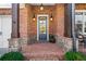 Inviting front entry with brick walkway and stylish front door at 3760 Montebello Pkwy, Cumming, GA 30028