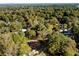 Aerial view showing home's location in a wooded neighborhood at 2791 Pearl St, East Point, GA 30344