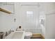 Clean bathroom with a shower/tub combo at 2791 Pearl St, East Point, GA 30344