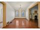 Empty dining room with hardwood floors and a chandelier at 2791 Pearl St, East Point, GA 30344