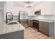 Modern kitchen featuring granite countertops, stainless steel appliances and white and grey cabinetry at 220 Hicks Se Dr, Marietta, GA 30060