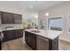 Well-equipped kitchen with island seating, granite countertops, and an open floor plan at 1341 Cedarcrest Blvd, Acworth, GA 30101