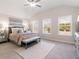 Serene main bedroom features lots of natural light and vaulted ceiling at 1341 Cedarcrest Blvd, Acworth, GA 30101