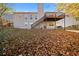 Two-story house with deck and fall leaves at 2804 Sterling Dr, Lawrenceville, GA 30043