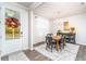 Formal dining room with chandelier and hardwood floors at 51 Riverbirch Way, Dallas, GA 30157