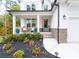 Inviting front porch with rocking chairs and fall decor at 51 Riverbirch Way, Dallas, GA 30157