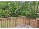 Deck overlooking a large backyard with mature trees at 1625 Austin Dr, Decatur, GA 30032