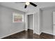 Bright bedroom with dark hardwood floors and spacious closet at 1625 Austin Dr, Decatur, GA 30032