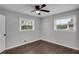 Well-lit bedroom with hardwood floors and ceiling fan at 1625 Austin Dr, Decatur, GA 30032