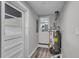 Laundry room with water heater and access to the backyard at 1625 Austin Dr, Decatur, GA 30032