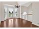 Bright dining room with hardwood floors and a bay window at 167 Sentry Rdg, Dallas, GA 30157