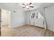 Bright bedroom with large window, ample natural light, ceiling fan and wood floors at 1284 Piedmont Ne Ave # 5, Atlanta, GA 30309