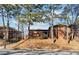 Exterior side view of brick building on a lot with trees and other buildings nearby at 1284 Piedmont Ne Ave # 5, Atlanta, GA 30309