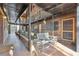 Exterior corridor with bench, tables, plants and access to apartments at 1284 Piedmont Ne Ave # 5, Atlanta, GA 30309
