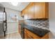 Updated kitchen with stainless steel appliances, granite countertops, and stylish backsplash at 1284 Piedmont Ne Ave # 5, Atlanta, GA 30309