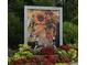 Atlanta Botanical Garden entrance sign with decorative artwork and lush landscaping at 1284 Piedmont Ne Ave # 5, Atlanta, GA 30309