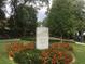Ansley Park sign with greenery, flowers, and trees at 1284 Piedmont Ne Ave # 5, Atlanta, GA 30309
