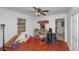 This bedroom has hardwood floors, one window and a ceiling fan at 1350 Ruth, Decatur, GA 30035