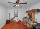 This bedroom has hardwood floors, a ceiling fan and a window at 1350 Ruth, Decatur, GA 30035