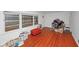 Cozy living room with hardwood floors and abundant natural light at 1350 Ruth, Decatur, GA 30035