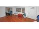 Cozy living room with hardwood floors and abundant natural light at 1350 Ruth, Decatur, GA 30035