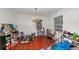 Chandelier-lit living room with natural light and hardwood floors at 1350 Ruth, Decatur, GA 30035