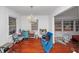 Chandelier-lit living room with natural light and hardwood floors at 1350 Ruth, Decatur, GA 30035