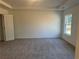 Bright bedroom with neutral carpeting and large window at 372 Bloomfield Cir, Canton, GA 30114