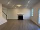 Spacious living room featuring a fireplace and hardwood floors at 372 Bloomfield Cir, Canton, GA 30114