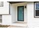 Newly painted teal front door with glass panels at 6990 Factory Shoals Rd, Austell, GA 30168