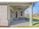 Covered patio with ceiling fan and access to backyard at 2760 Marie Way, Cumming, GA 30028