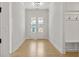 Bright entryway with double doors and built-in bench at 2760 Marie Way, Cumming, GA 30028