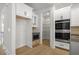 Kitchen boasts ample storage and double ovens at 2760 Marie Way, Cumming, GA 30028