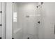 Spacious shower with marble tile and built-in seat at 2760 Marie Way, Cumming, GA 30028