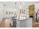 Open concept kitchen and Gathering room with island and breakfast area at 2780 Marie Way, Cumming, GA 30028