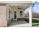 Covered patio with ceiling fan and access to backyard at 2780 Marie Way, Cumming, GA 30028