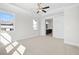 Bright and spacious bedroom with large windows and en-suite bathroom access at 2735 Marie Way, Cumming, GA 30028