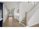 Bright and spacious entryway with hardwood floors and a grand staircase at 2735 Marie Way, Cumming, GA 30028