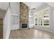 Spacious Gathering room with stone fireplace and built-in shelving at 2735 Marie Way, Cumming, GA 30028