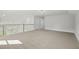 Bright loft bedroom with carpet and plenty of space at 2735 Marie Way, Cumming, GA 30028
