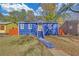 Charming blue house with well-maintained lawn and landscaping at 2067 Arlington Nw Cir, Atlanta, GA 30318