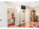 Bedroom view into hallway and living spaces, showing flooring and layout of the home at 112 Christopher Ln, Stockbridge, GA 30281