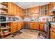 Well-lit kitchen with wood cabinets and stainless steel appliances at 112 Christopher Ln, Stockbridge, GA 30281